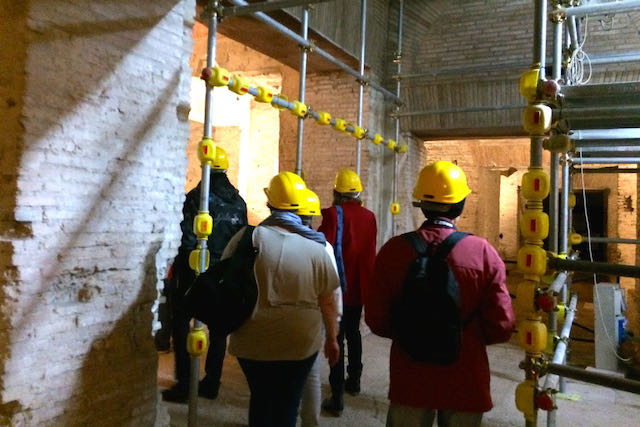 visitors on tour inside the domus aurea